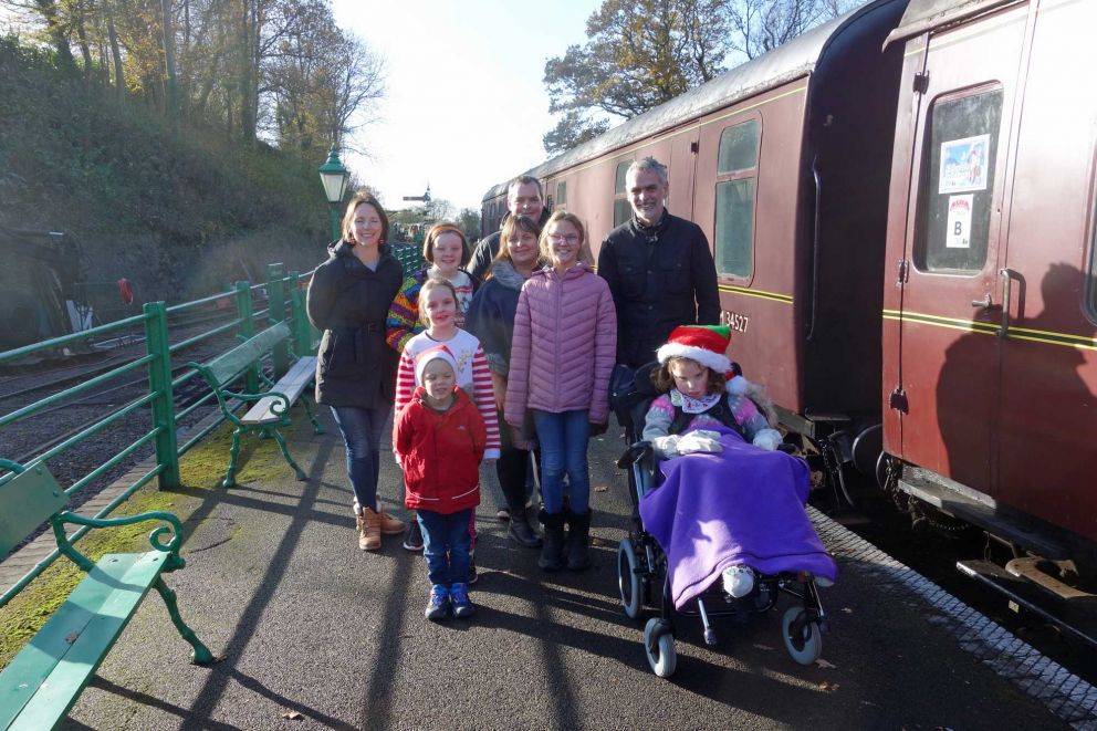 Family pause for a photo after trip on Santa train - 04 12 21