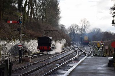 Sentinel 7109 Joyce on a test run; Engineering train waits in the up line